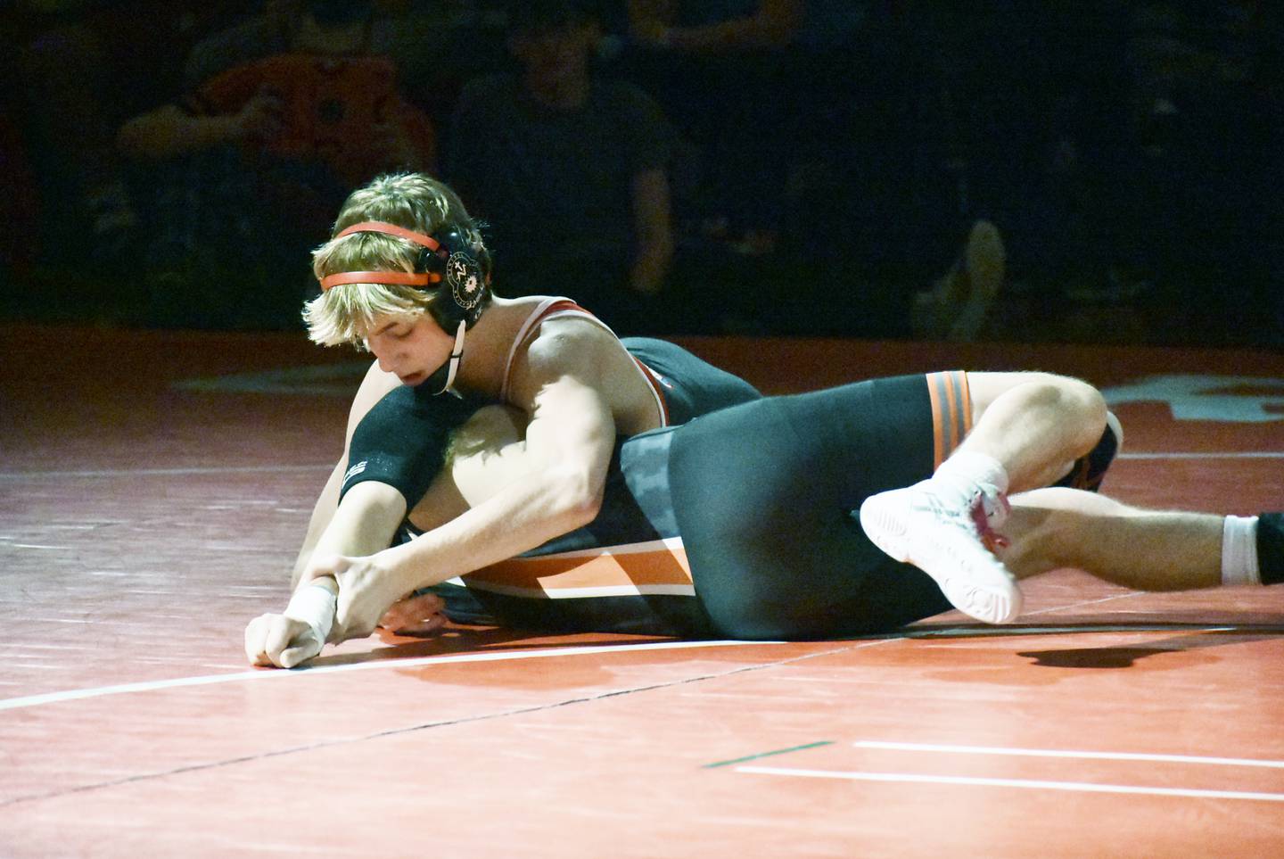 Marian Central’s Austin Hagevold looks to turn Sandwich’s Leo Harbacek during the IHSA Class 1A Dual Sectional at Oregon on Tuesday, Feb. 25, 2025 in Oregon.
