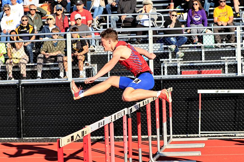 Morrison's Josh McDearmon flew over the hurdles in the 110m hurdle race in Erie on Wednesday. McDearmon took 1st in the event with a time of 15:32, advancing to the state finals next week.