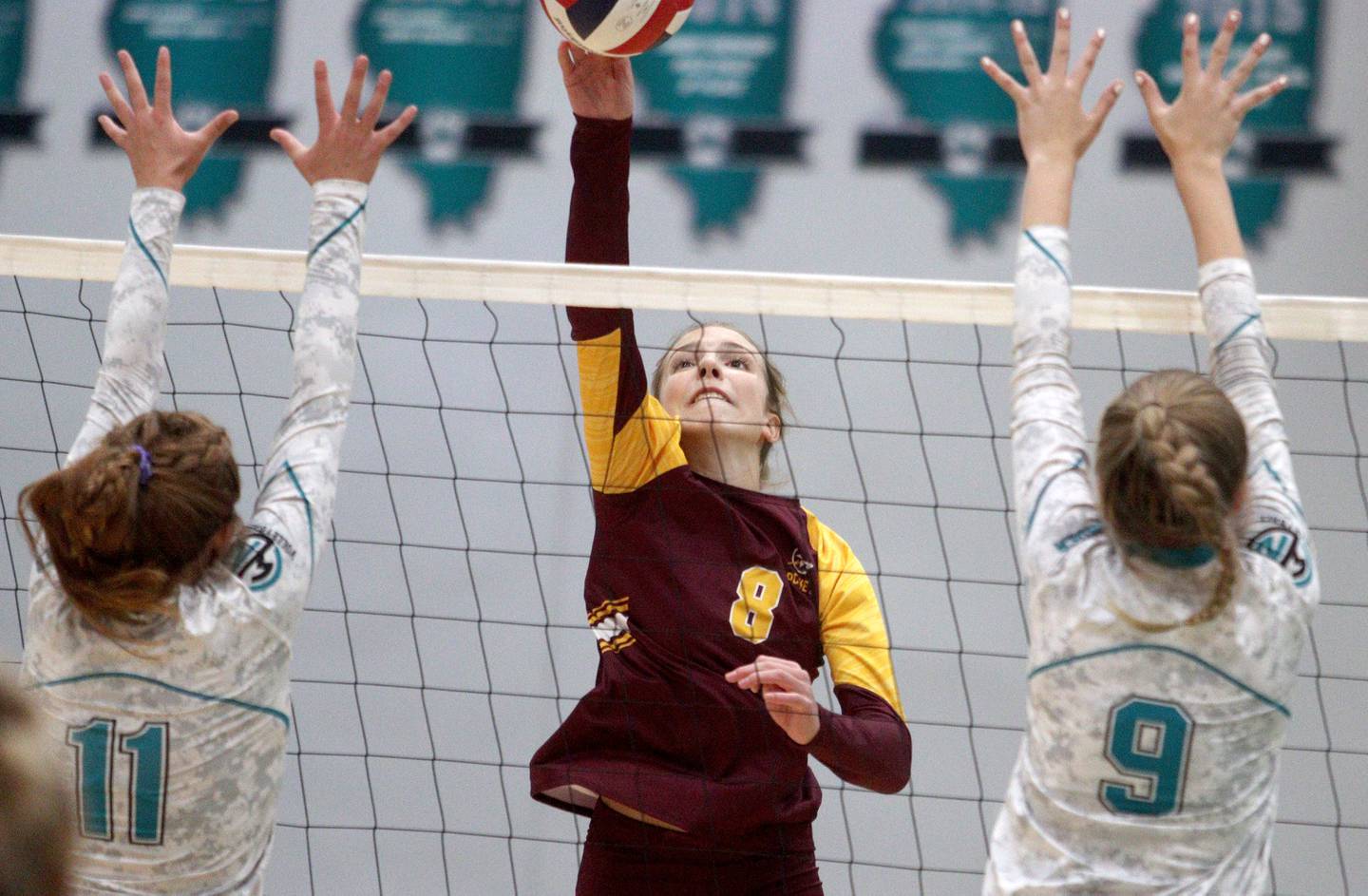 Richmond-Burton’s Danni Hopp hits the ball in varsity volleyball at Woodstock North Monday night.