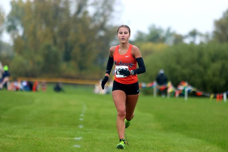 McHenry’s Danielle Jensen wins the Fox Valley Conference Girls Cross Country Meet at Plato Park in Elgin Saturday.