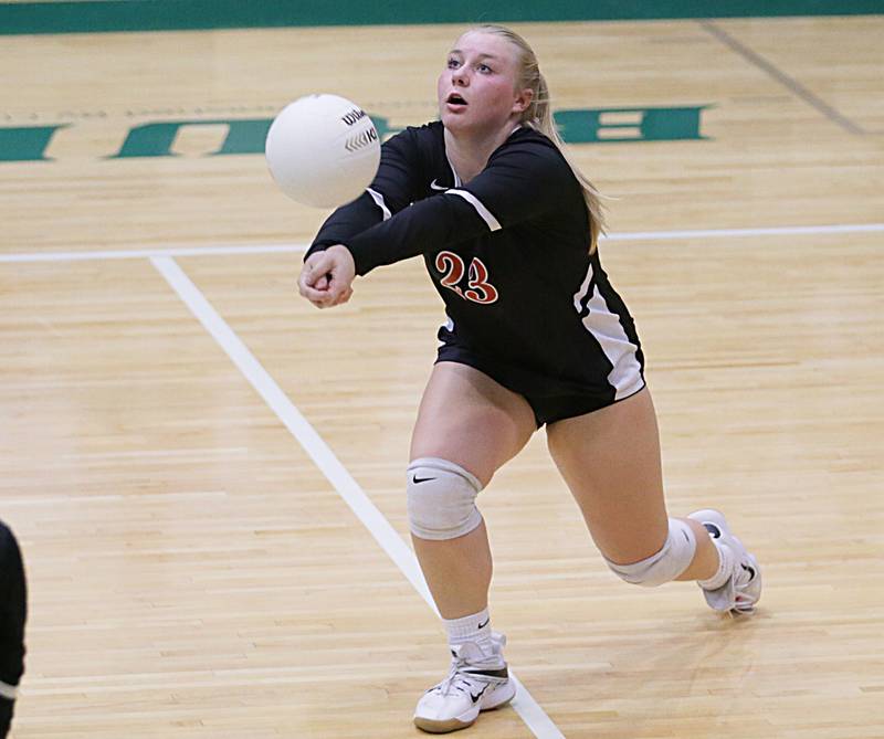 Earlville's Brooklyn Guelde (23) hits the ball against Putnam County in the Class 1A Regional game on Monday, Oct. 24, 2022 at St. Bede Academy in Peru.