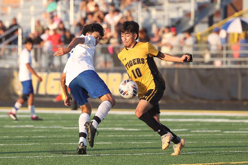 Joliet West’s Adrian Maldonado blocks a shot by Joliet Central’s Brautio on Tuesday, Oct. 3, 2023 in Joliet.