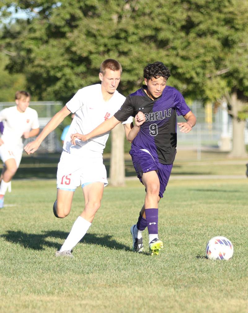 Rochelle's Yandel Mendez (9) fights for possession of the ball during the game with La Salle-Peru on Oct. 9, 2025.