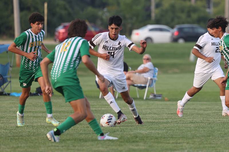 Joliet Catholic’s Leonardo Marquez works the ball midfield against Providence on Aug. 21, 2023 in New Lenox.