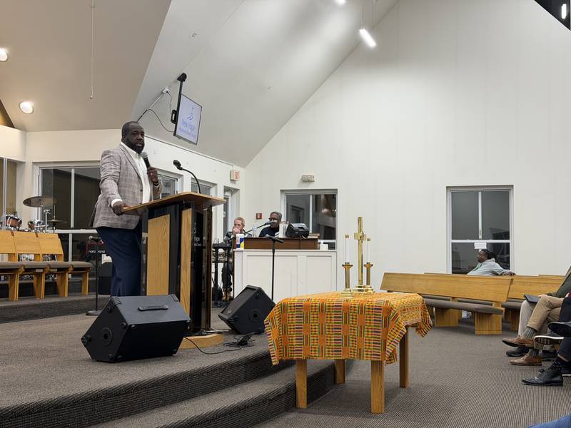 The Rev. Joe Mitchell, senior pastor at New Hope, welcomes a crowd of about 75 gathered on Martin Luther King Jr. Day on Monday, Jan. 19, 2026, at New Hope Missionary Baptist Church in DeKalb for the annual MLK Day Celebration.