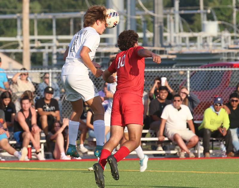 Kaneland's Noah McKittrick applies a header over L-P's Giovanni Garcia on Monday, Aug. 28, 2023 at the L-P Athletic Complex in La Salle.