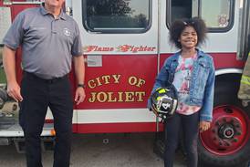 Joliet girl wins ride to school on fire truck