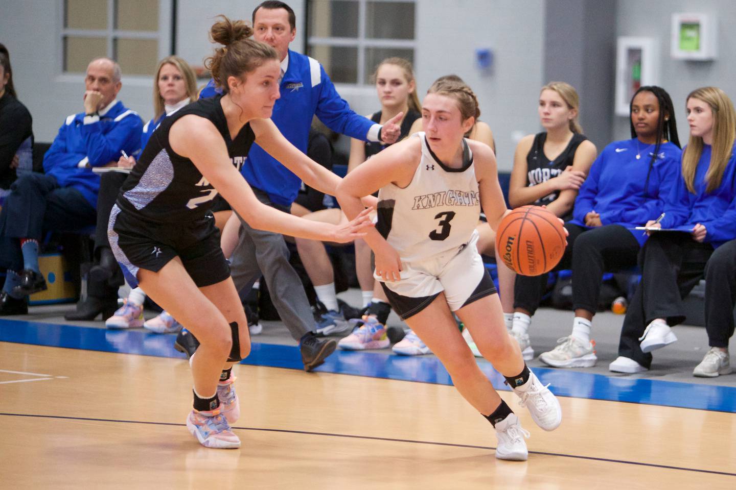 St. Charles North's Reagan Sipla guards Kaneland's Alexis Schueler at the Central Girl's Basketball Thanksgiving Tournament on Wednesday,Nov. 16, 2022 in Burlington.