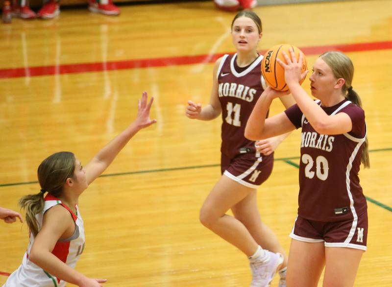 Morris's Landrie Callahan shoots a jump shot over L-P's Phoebe Shetterly on Friday, Dec. 6, 2024 in Sellett Gymnasium at L-P High School.
