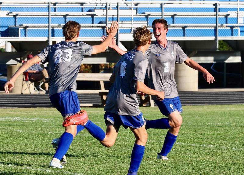 Princeton's Jacoby Smallwood (23) celebrates a goal with teammate Tyler VanDeventer in Tuesday's match vs. Stillman Valley at Bryant Field. Smallwood scored three goals to lead the Tigers to a 4-0 win.
