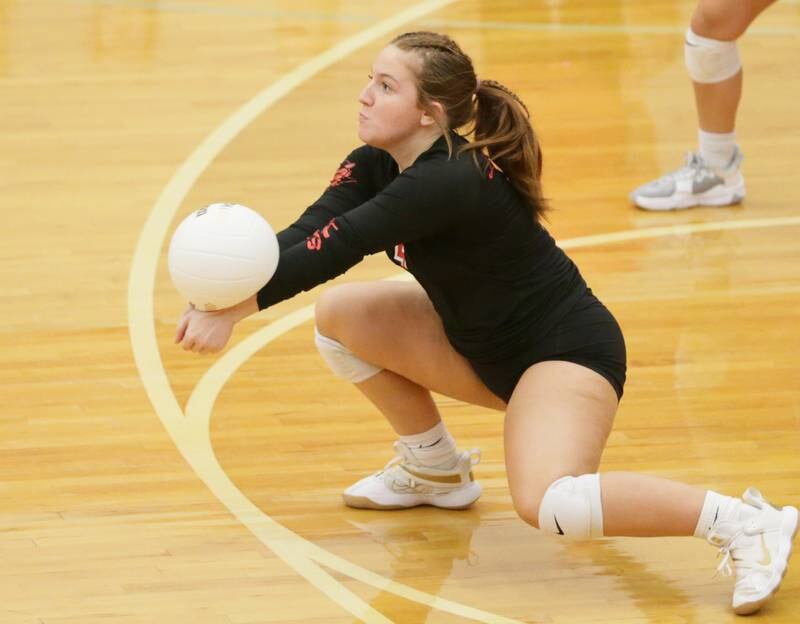 Hall's Evey Meyer returns a serve against Bureau Valley in the Class 2A Regional game on Monday, Oct. 24, 2022 at Hall High School in Spring Valley.