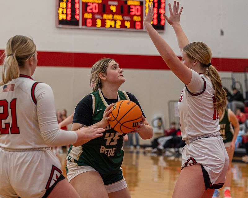 Savannah Bray (45) of St. Bede looks up to rim before shooting ball whilst being defended by Caroline Morris (13) of Hall on Saturday, January 31, 2026 at Hall High School in Spring Valley.
