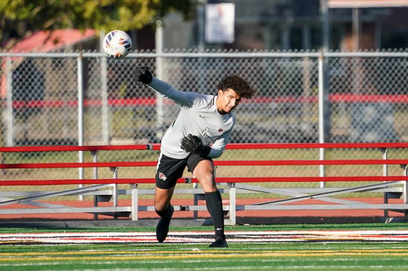 Yorkville's Caleb Reveter (1) throws the ball into play during a soccer match against Yorkville at Yorkville High School on Tuesday, Oct. 15, 2024.