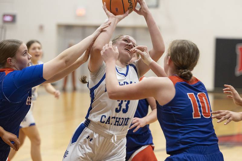 Newman’s Veronica Haley works below the basket against Eastland Tuesday, Feb. 18, 2025, during the Class 1A girls basketball regional at Forreston.