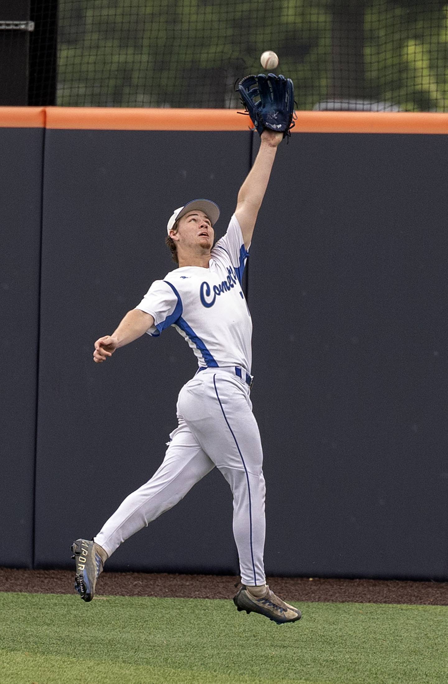 Newman’s Ashton Miner reaches and makes a great catch in deep right field against Eureka Saturday, June 7, 2025, during the Class 2A state baseball third place game at Illinois Field in Champaign.