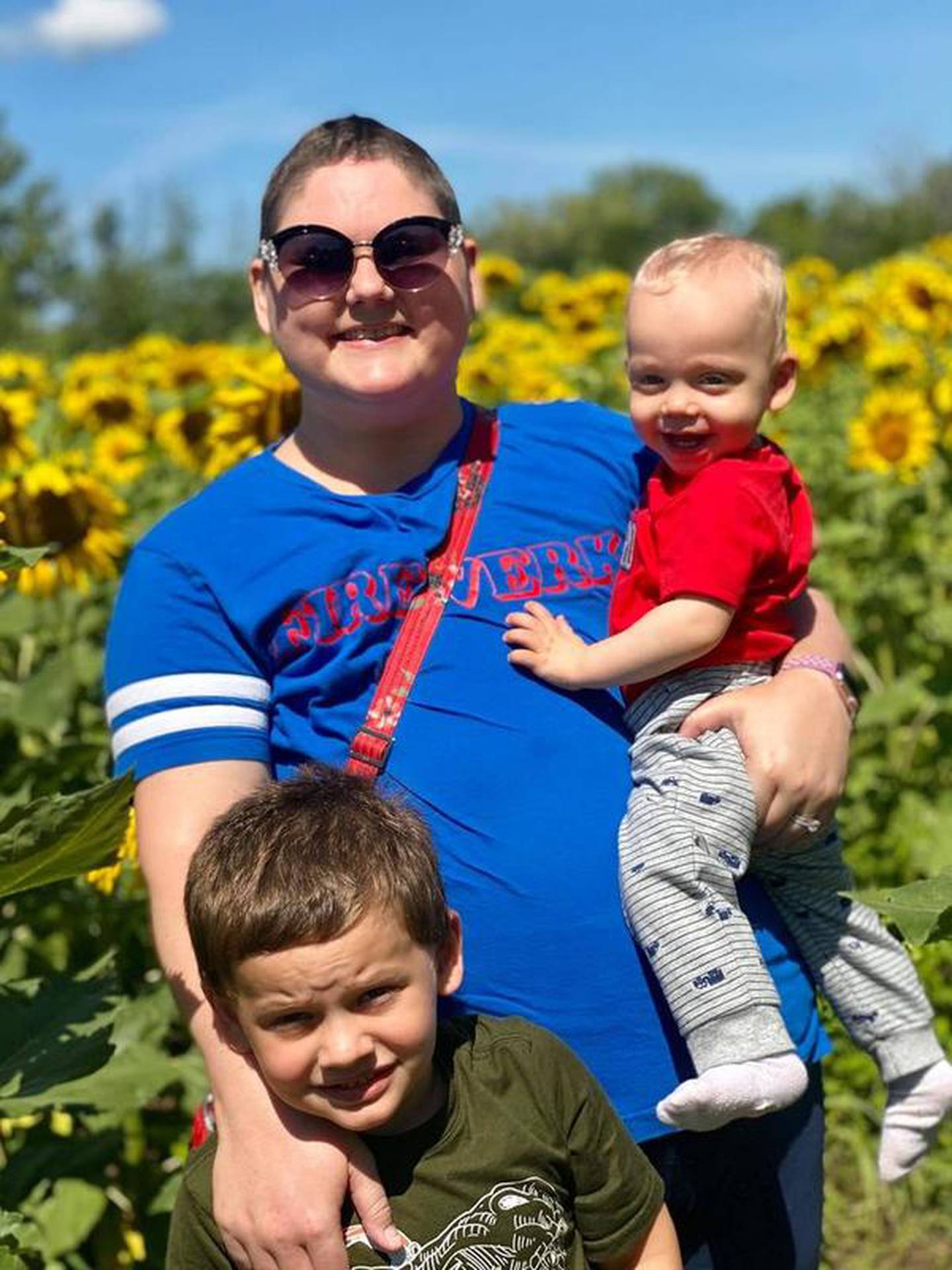 Chiara Robinette, 33, of Minooka, is pictured with her sons Richard, 5, and Henry. She is living in the moment and fighting stage 4 breast cancer with smiles and all her strength.
