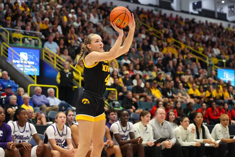 Iowa Hawkeyes guard Kylie Feuerbach (4) makes a 3-pointer during the first quarter of their game in the championship of the Gulf Coast Showcase at Hertz Arena in Estero, Florida on Sunday, November 26, 2023.