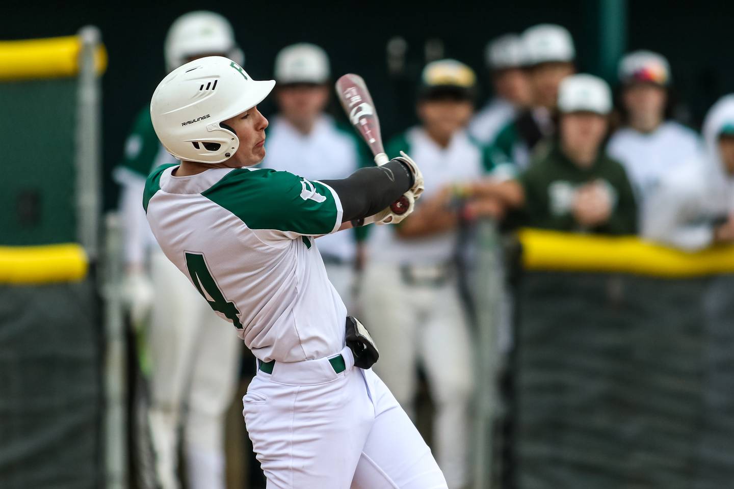 Plainfield Central's Taylor Kujak (4) connects on a pitch during varsity baseball game between Oswego at Plainfield Central.  April 4, 2023.