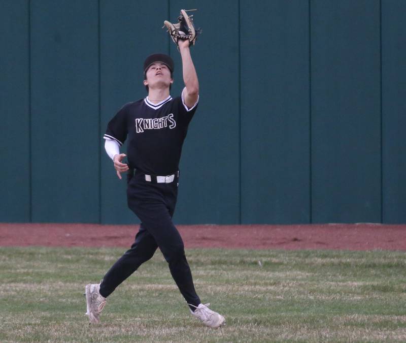 Kaneland's Zach Ramos makes a catch in right field against L-P on Thursday, April 11, 2024 at Huby Sarver Field in La Salle.