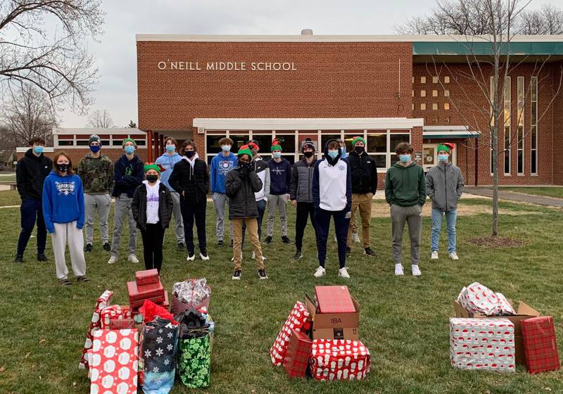 The Evan's Elves charity organization this week donated gift cards and presents to families in need at Downers Grove South High School and O'Neill Middle School in memory of Evan Melau, a 15-year-old Downers Grove boy struck and killed by a car in June.