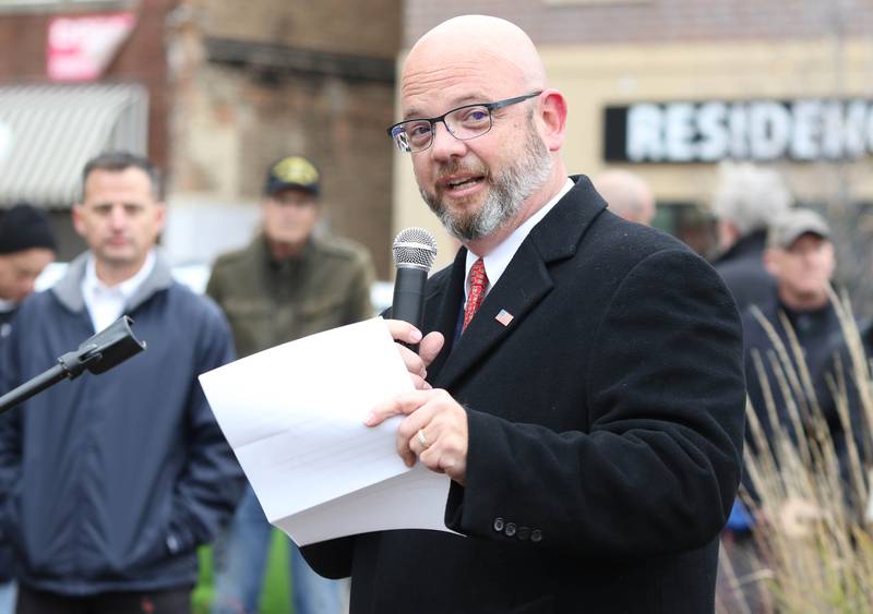 State Rep. Jeff Keicher, R-Sycamore, speaks Thursday, Nov. 11, 2021, during a Veterans Day and Soldiers' and Sailors' Memorial Clock rededication ceremony in downtown DeKalb.