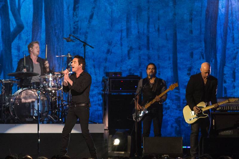 Musical group Train performs on stage at the MusiCares 2014 Person of the Year Tribute on Friday, January 24, 2014 in Los Angeles. (Photo by Paul A. Hebert/Invision/AP)