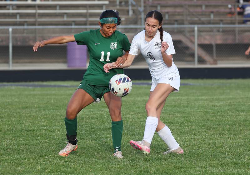 Kaneland's Taylor Mills (right) and Boylan's MaryTherese Harrison fight for possession Wednesday, May 28, 2025, during their Class 2A sectional semifinal game at Belvidere High School.