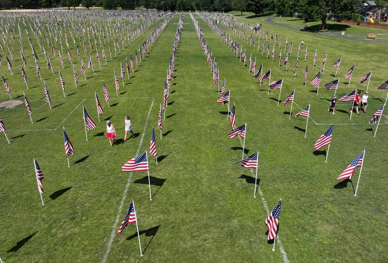 It took a team of volunteers approximately 45 minutes to place 2,025 flags during setup for the Wheaton Field of Honor at Seven Gables Park on Saturday, June 28, 2025.