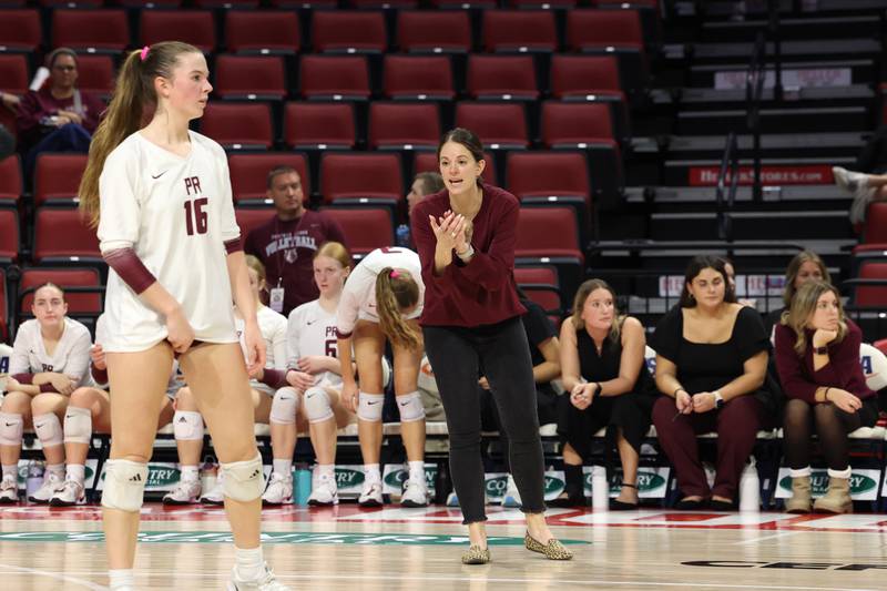 Prairie Ridge head coach Leah Groat encourages her team during the Wolves' loss in two sets, 25-20, 25-28, in the IHSA Class 3A State semifinals on Friday, Nov. 14, 2025.