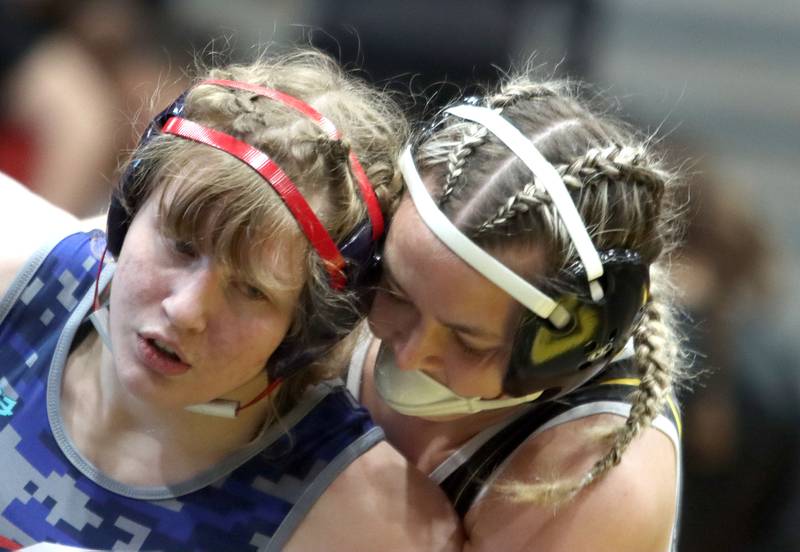 South Elgin’s Allison Garbacz, left, battles Hinsdale South’s Callie Carr at 155 pounds in varsity girls IHSA Sectional wrestling on Saturday, February 14, 2026, at Schaumburg High School in Schaumburg.