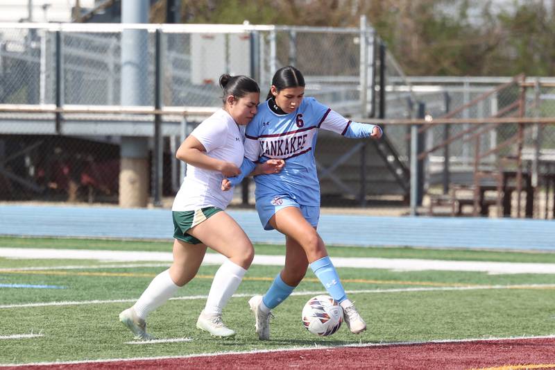 Kankakee's Isabella Marin dribbles toward the goal against Bishop McNamara's Kendra Escamilla during the Kays' 8-0 victory in the final All-City match on Saturday, April 11, 2026.