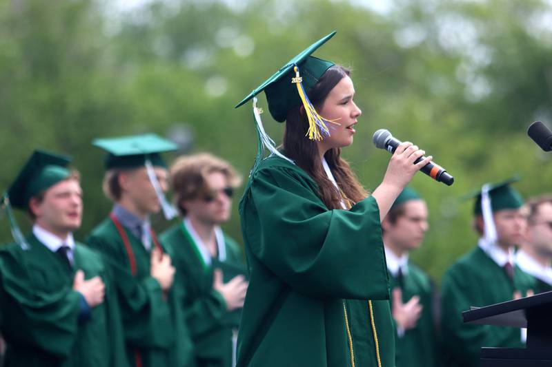 Olivia Glod sings the national anthem during graduation at York High School in Elmhurst on Sunday, May 18, 2025.