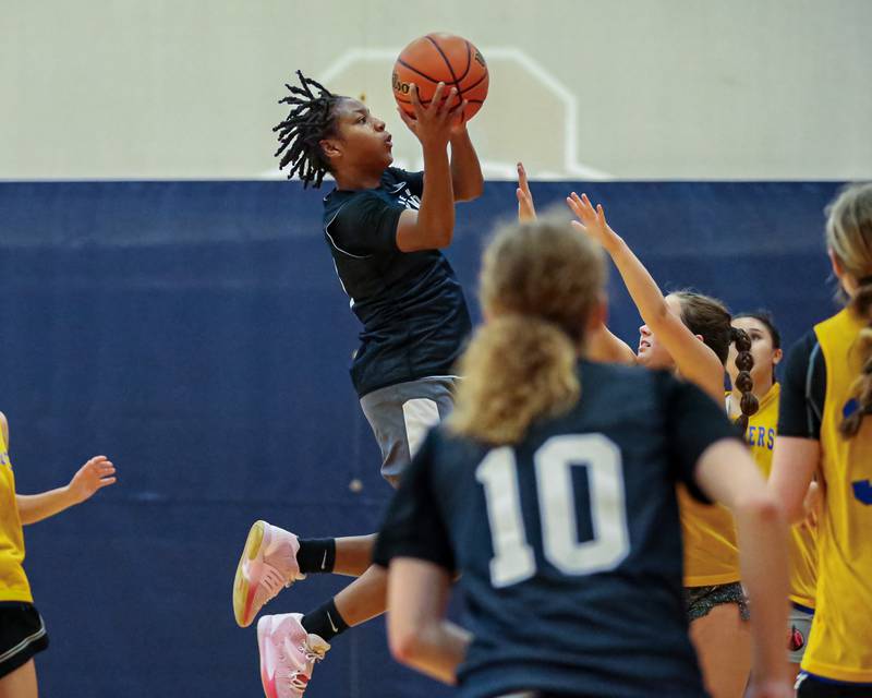 Oswego East's Desiree Merritt puts up a shot at the Oswego Girls Basketball Shootout . June 30, 2023.
