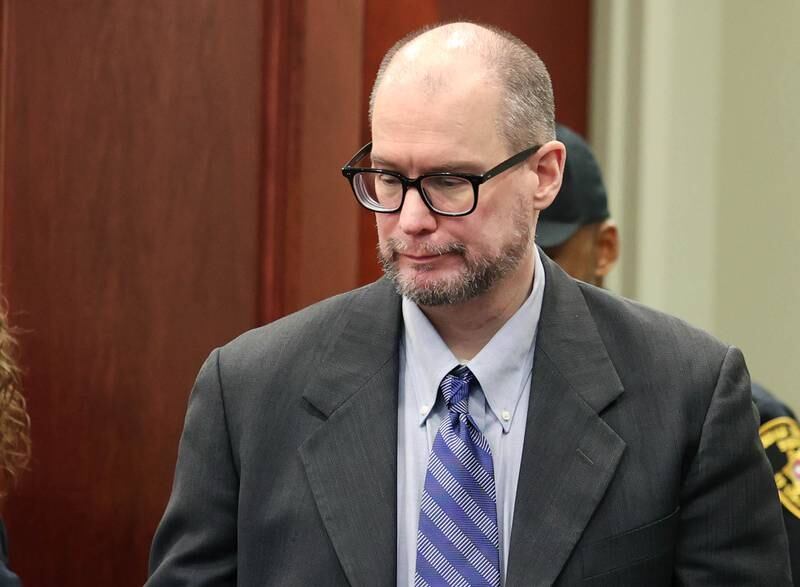 Jonathan Hurst enters the courtroom Monday, Jan. 27, 2025, during day three of his trial at the DeKalb County Courthouse in Sycamore. Hurst is charged in the 2016 slayings of Sycamore elderly mother and son Patricia and Robert Wilson.