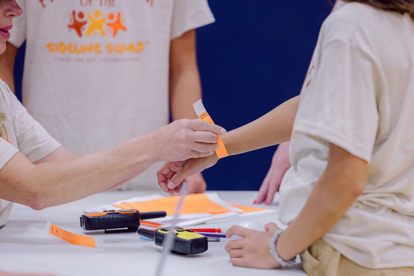 The Sideline Squad held a practice run at McHenry's Parkland School on Monday, Aug. 26, 2024, including the wristbands, drop off and pickup procedures. The club allows parents to watch older siblings' games while paying to give children 3-12 an alternative activity.
