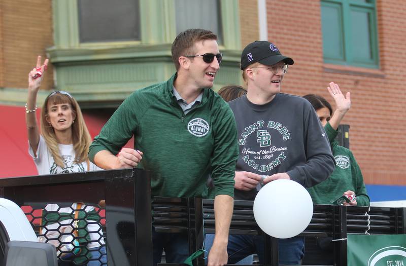 St. Bede alumini ride on a float during the St. Bede Homecoming parade on Friday, Sept. 27, 2024 downtown Peru.