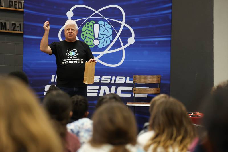 Magician Charlie Mount explains a magic trick and forming hypotheses during the Impossible Science event at the Kankakee First Church of the Nazarene on May 5, 2026.