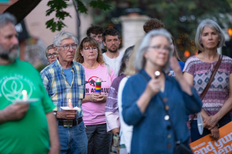 A candlelight vigil was held at the Kane County Courthouse in Geneva on Wednesday, July 6, 2022. The vigil was organized to honor the mass shooting at a Fourth of July Parade in Highland Park.