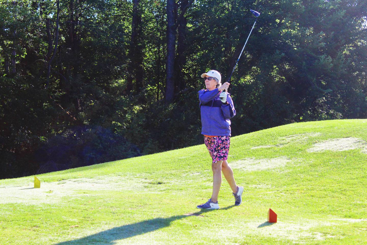 Marve Feucht tees off from No. 10 at the Lake Carroll Golf Course during the Mr. and Mrs. Club Championship on Aug. 24.