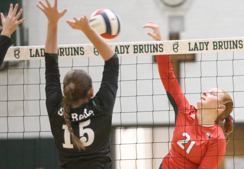 Henry-Senachwine's Brynna Anderson spikes the ball past St. Bede's Jillian Pinter during the Class 1A Regional final game on Thursday, Oct. 31, 2024 at St. Bede Academy.