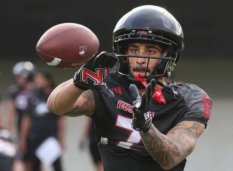 Northern Illinois University wide receiver Cam Thompson makes a catch Tuesday, April 14, 2026, during a drill at spring practice in Huskie Stadium at NIU in DeKalb.