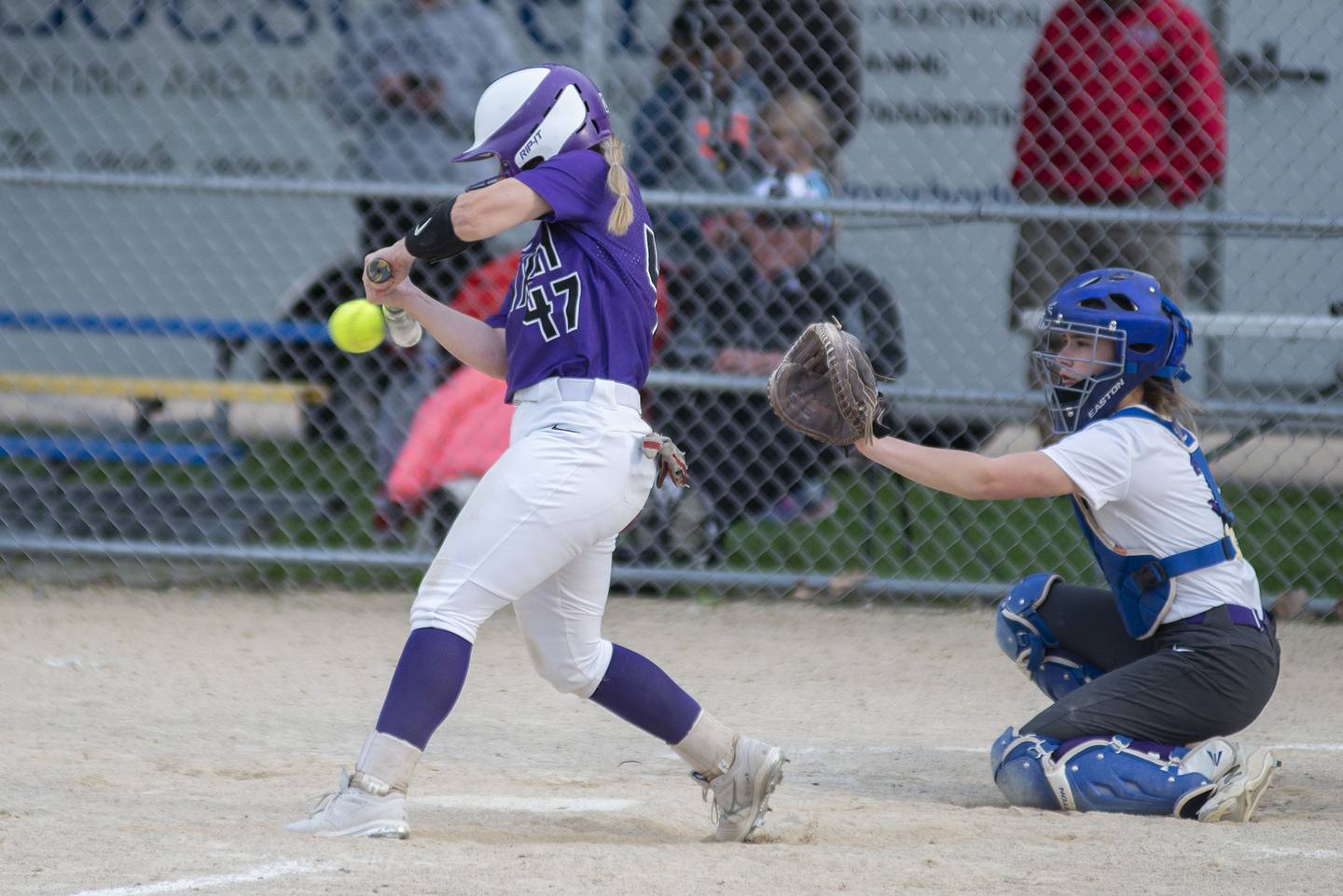 Dixon's Ana Kate Phillips drives the ball to the right, scoring two runs late in the game against Rochelle Tuesday, May 24, 2022.