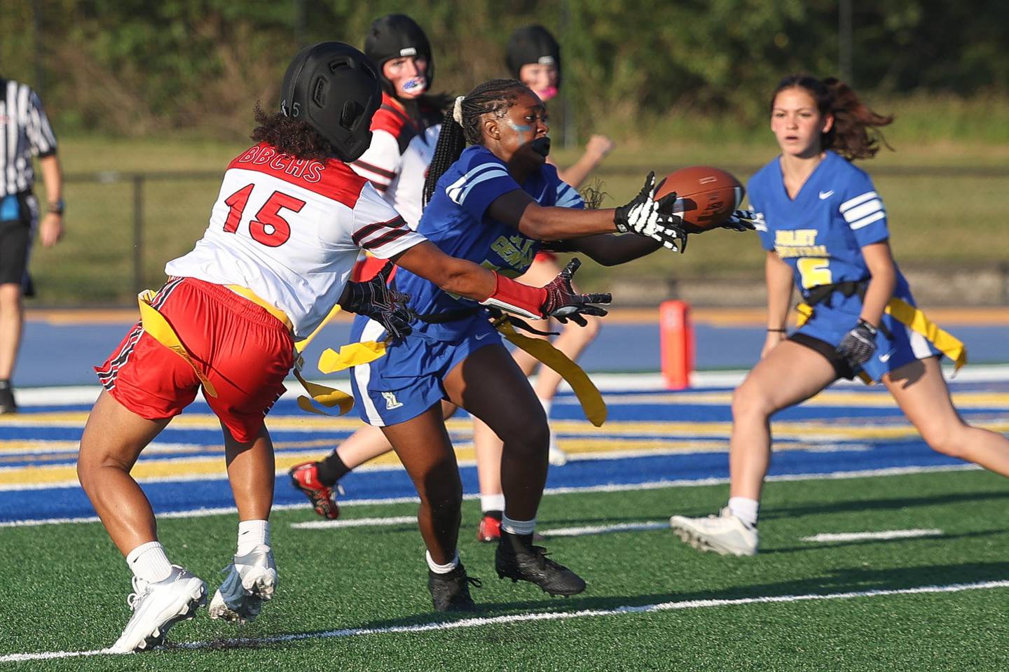 Joliet Central’s Ta’lyanna Nicks intercepts a pass in their inaugural flag football game against Bradley-Bourbonnais on Thursday, August 29, 2024 in Joliet.