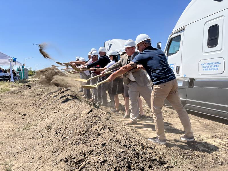 Plainfield Mayor John Argoudelis (right) joins officials with MNS1 Express to break ground for the MNS1 Express's new location in Plainfield on Thursday, July 14, 2022.
