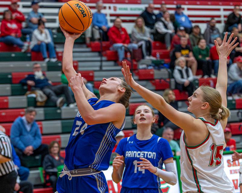 Keighley Davis (24) of Princeton lays up ball as L-P's Margaret Boudreau (15) attempts to contest shot on Saturday, Feb. 7, 2026 in Sellett Gymnasium at L-P High School.
