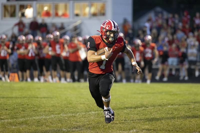 Amboy’s Jose Lopez looks towards the end zone against Milledgeville Friday, August 29, 2025, in Amboy.