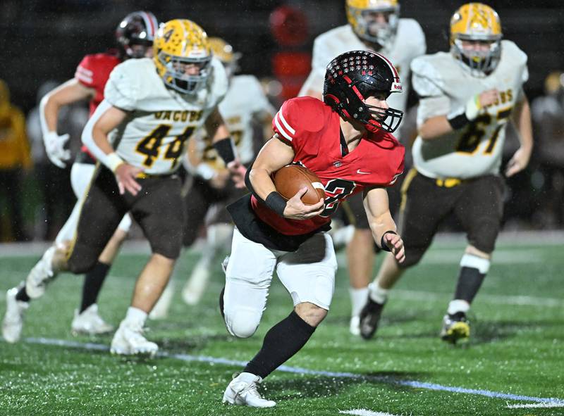 Lincoln-Way Central's Anthony Noto runs the ball during the class 7A first round  playoff game on Friday, Oct. 27, 2023, at New Lenox. (Dean Reid for Shaw Local News Network)
