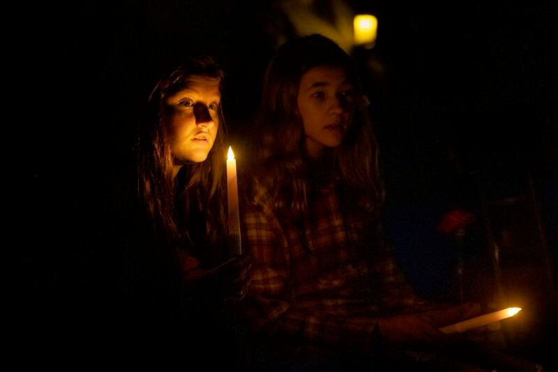 Mourners attend a vigil Sunday, March 31, 2024 at the Tampico Community Center in memory of three local boys who died Thursday in a collision.