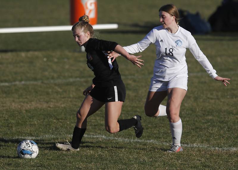 Crystal Lake Central's Olivia Anderson beats \p18 to the ball during a nonconference soccer match Thursday, April 6, 2023, at Crystal Lake Central High School.