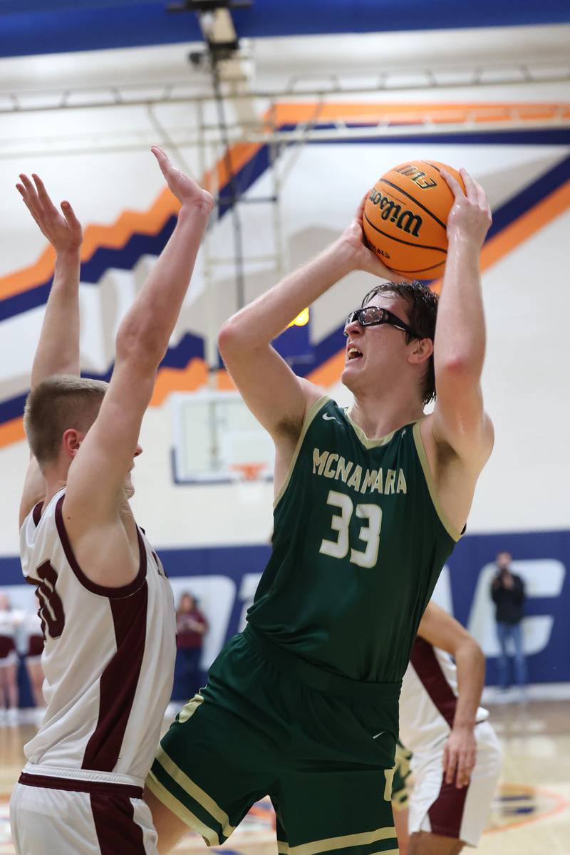 Bishop McNamara's Callaghan O'Connor puts up a shot during the Fightin' Irish's 77-70 loss to Tolono Unity in the IHSA Class 2A Pontiac Supersectional on Monday, March 9, 2026.